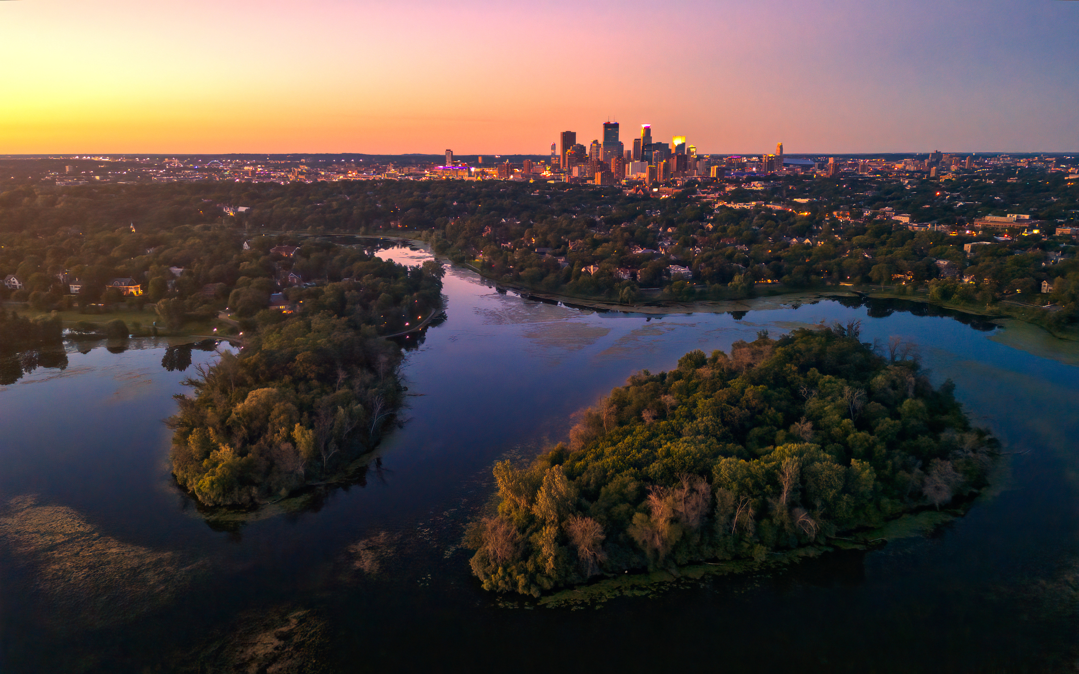 Minneapolis skyline sunset lake of the isles